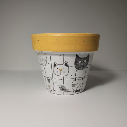 Maceta cabeza de gatos