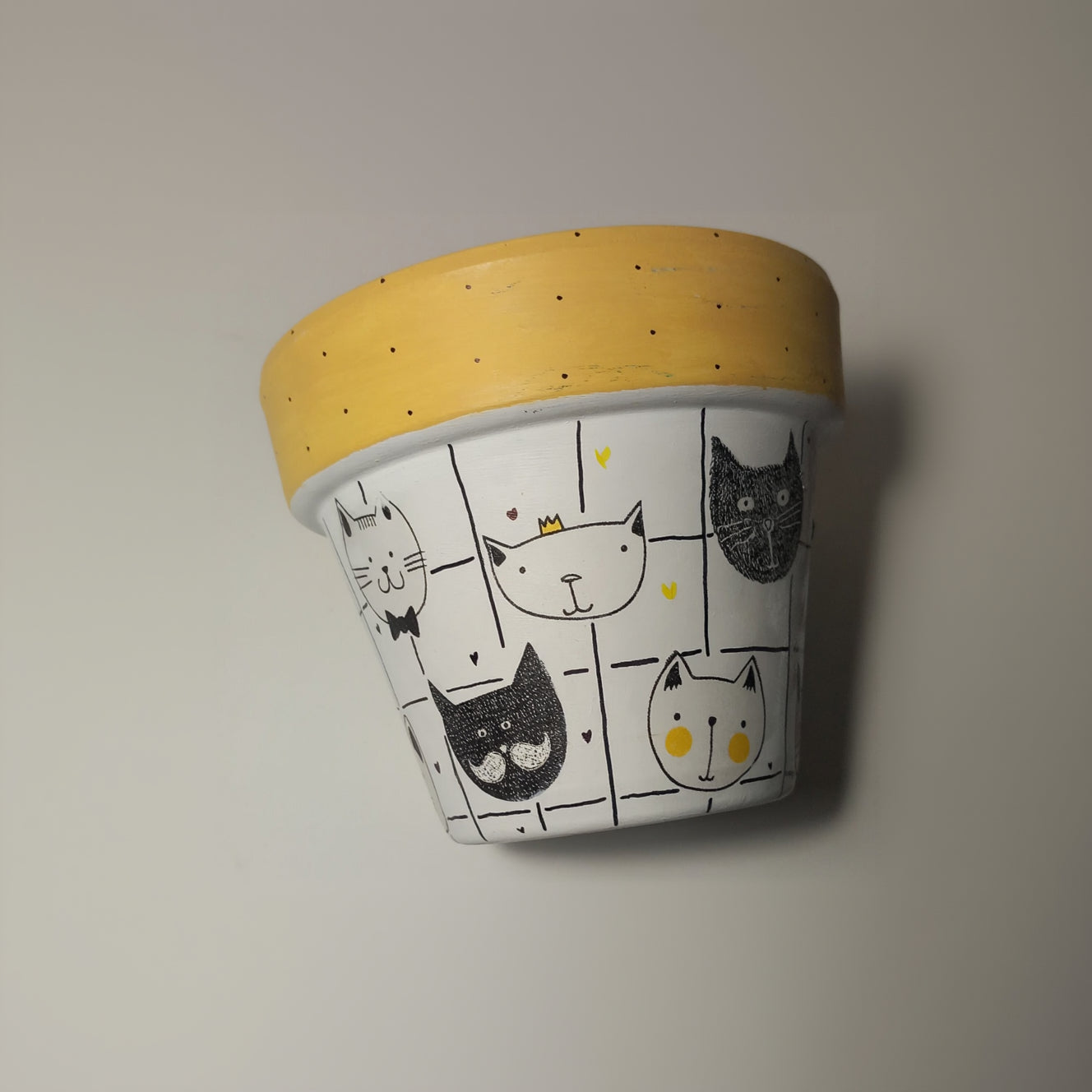 Maceta cabeza de gatos